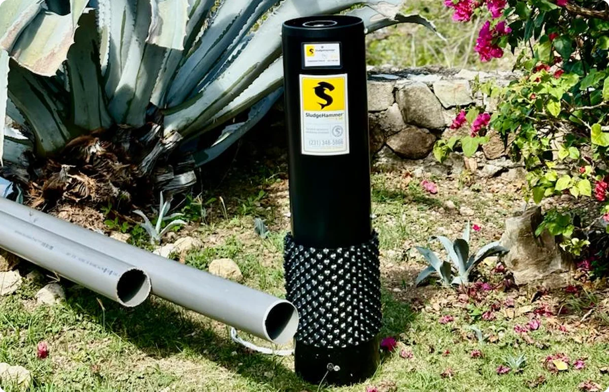 SludgeHammer reactor installed inside a septic tank